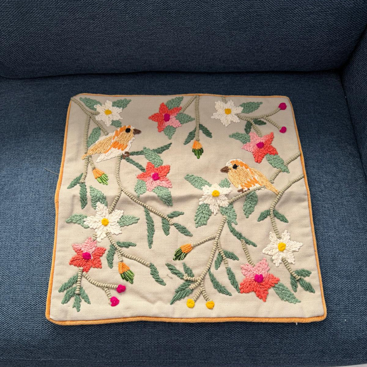 Embroidered square with birds and flowers